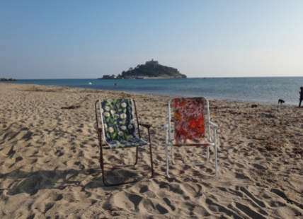 Deck chairs on the beach at Marazion